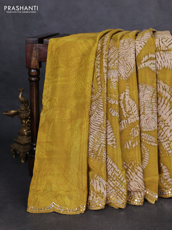Crepe silk saree mustard green with allover tie & dye prints and mirror embroidery pallu
