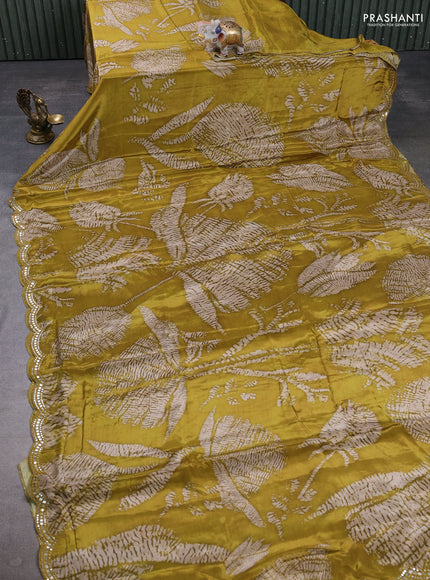Crepe silk saree mustard green with allover tie & dye prints and mirror embroidery pallu