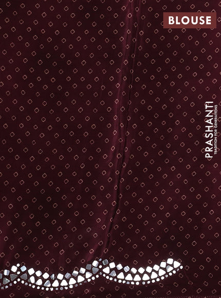 Crepe silk saree wine shade with allover tie & dye prints and mirror embroidery pallu