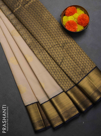 Semi kanchipuram silk saree beige and navy blue with zari woven buttas and zari woven korvai border