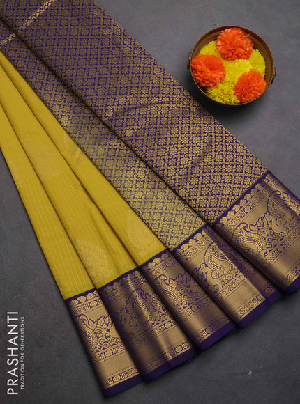 Semi kanchipuram silk saree lime yellow and blue with allover zari weaves & buttas and peacock zari woven korvai border