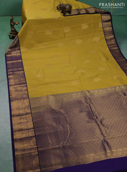 Semi kanchipuram silk saree lime yellow and blue with allover zari weaves & buttas and peacock zari woven korvai border