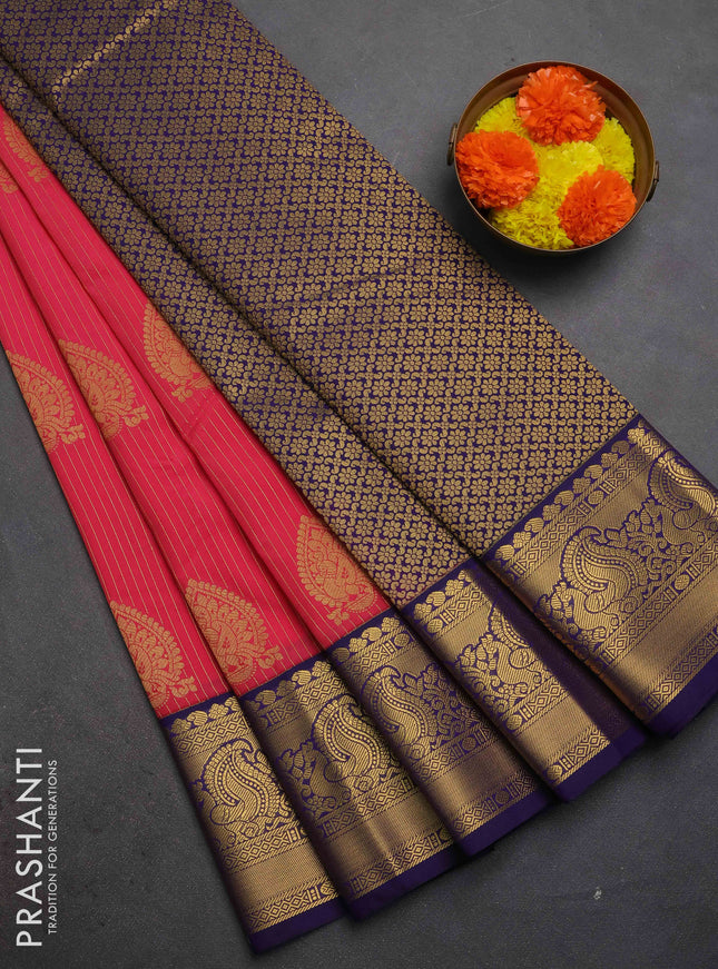 Semi kanchipuram silk saree pink and blue with allover zari weaves & buttas and peacock zari woven korvai border