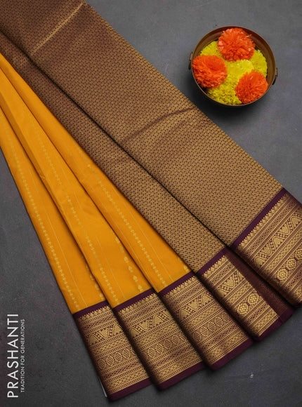Semi kanchipuram silk saree mango yellow and wine shade with allover zari weaves & buttas and zari woven korvai border