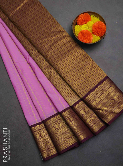Semi kanchipuram silk saree lavender and deep purple with allover zari weaves & buttas and zari woven korvai border