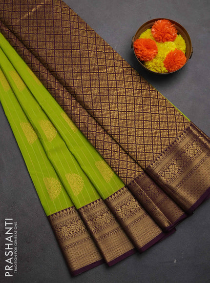 Semi kanchipuram silk saree light green and wine shade with allover zari weaves and zari woven korvai border