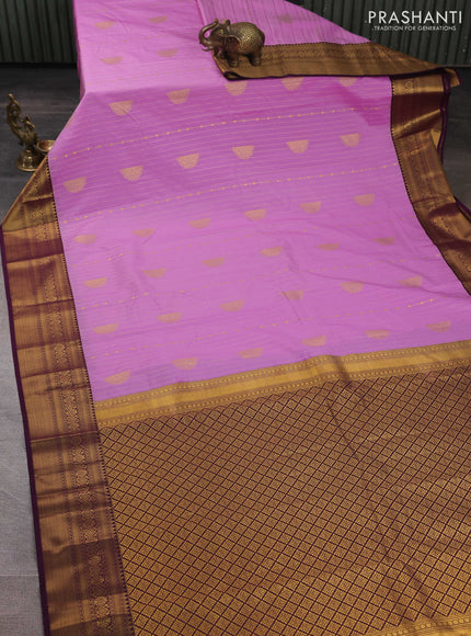 Semi kanchipuram silk saree lavender and wine shade with allover zari weaves and zari woven korvai border