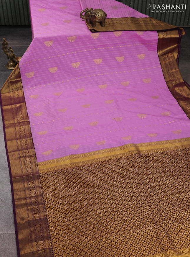 Semi kanchipuram silk saree lavender and wine shade with allover zari weaves and zari woven korvai border