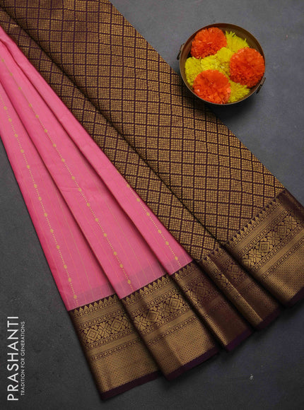 Semi kanchipuram silk saree light pink and wine shade with allover zari weaves and zari woven korvai border