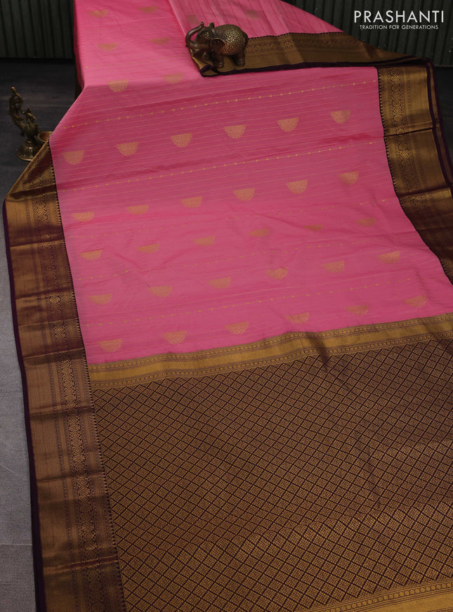 Semi kanchipuram silk saree light pink and wine shade with allover zari weaves and zari woven korvai border