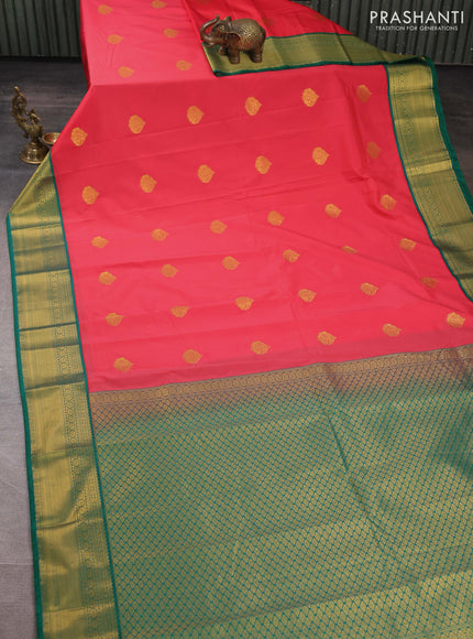 Semi kanchipuram silk saree tomato pink and green with zari woven buttas and zari woven border