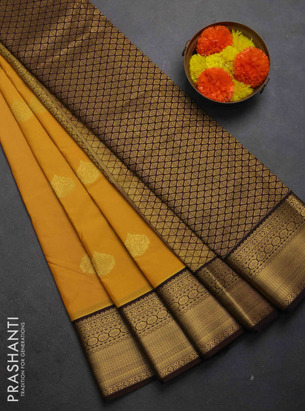Semi kanchipuram silk saree mustard yellow and coffee brown with zari woven buttas and zari woven korvai border