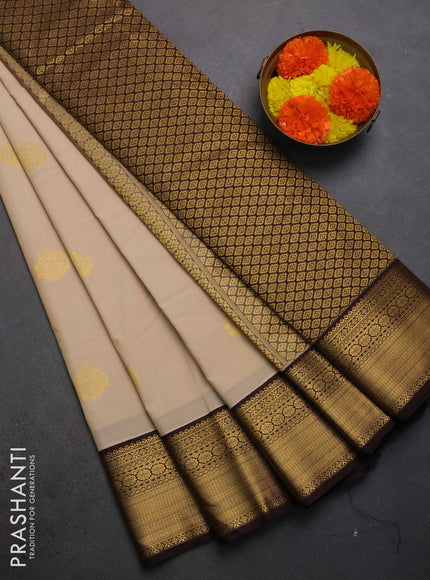 Semi kanchipuram silk saree beige and coffee brown with zari woven buttas and zari woven border