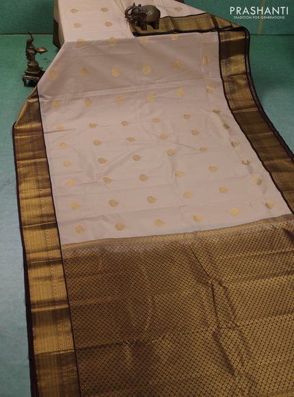 Semi kanchipuram silk saree beige and coffee brown with zari woven buttas and zari woven border