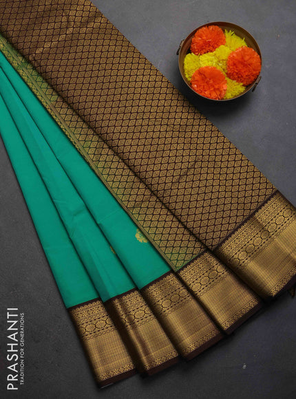 Semi kanchipuram silk saree teal green and coffee brown with allover zari woven buttas and zari woven border