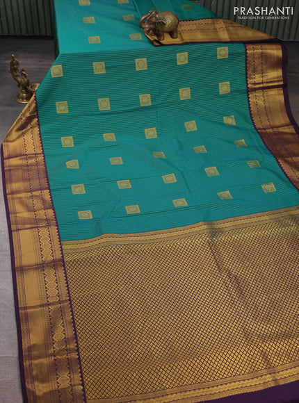 Semi kanchipuram silk saree green and deep violet with allover zari weaves & buttas and zari woven border