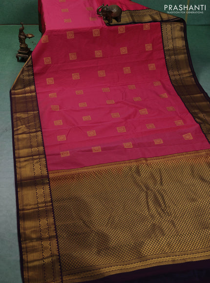 Semi kanchipuram silk saree peach pink and deep purple with allover zari weaves & buttas and zari woven border