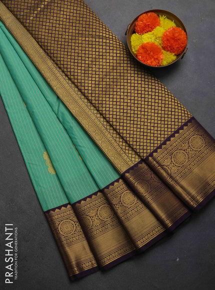 Semi kanchipuram silk saree teal green and deep purple with allover zari weaves & buttas and zari woven border