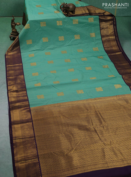 Semi kanchipuram silk saree teal green and deep purple with allover zari weaves & buttas and zari woven border