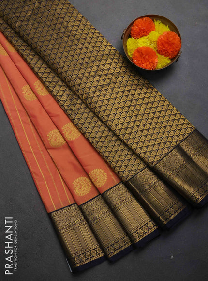 Semi kanchipuram silk saree dual shade of yellowish pink and navy blue with allover zari weaves & buttas and zari woven border