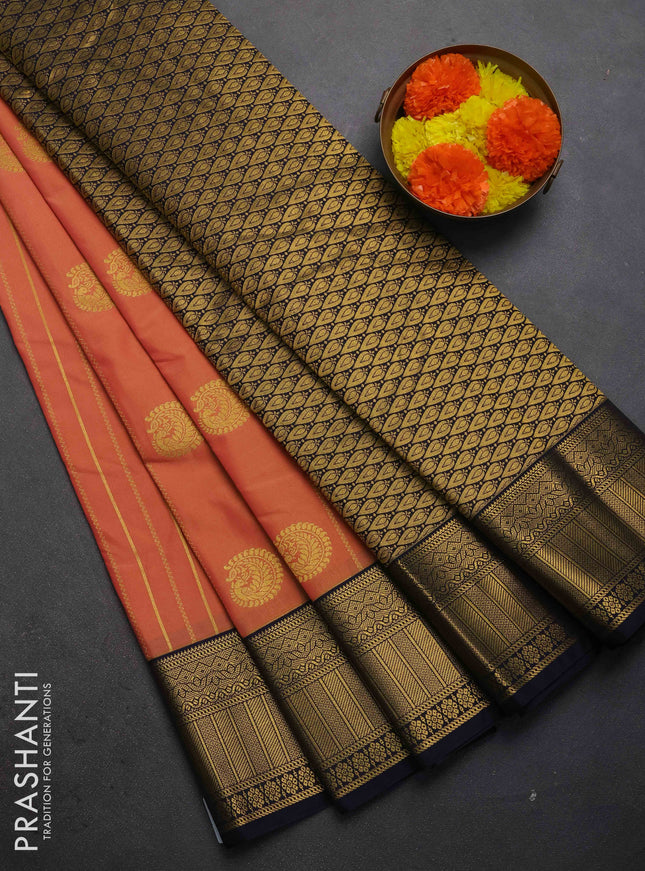 Semi kanchipuram silk saree dual shade of yellowish pink and navy blue with allover zari weaves & buttas and zari woven border