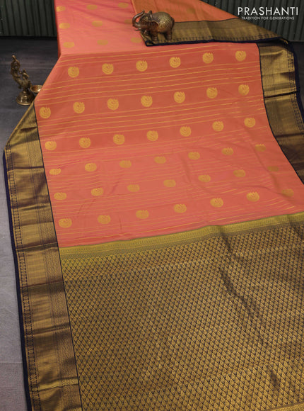 Semi kanchipuram silk saree dual shade of yellowish pink and navy blue with allover zari weaves & buttas and zari woven border
