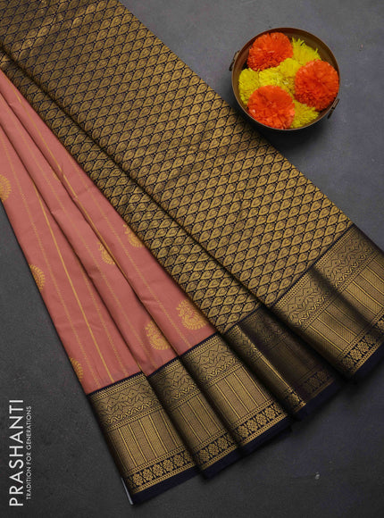 Semi kanchipuram silk saree pastel pink and navy blue with allover zari weaves & buttas and zari woven border