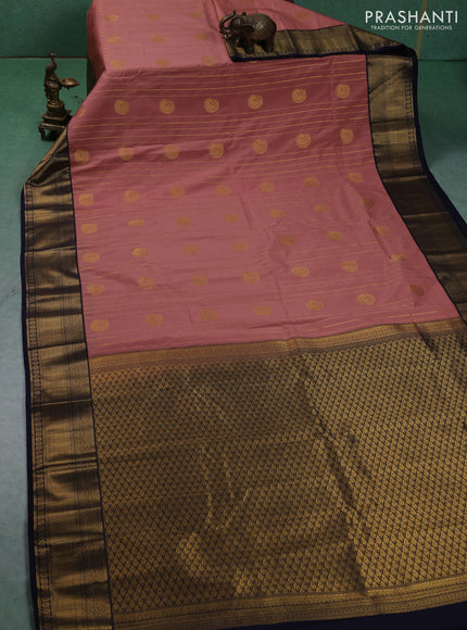 Semi kanchipuram silk saree pastel pink and navy blue with allover zari weaves & buttas and zari woven border