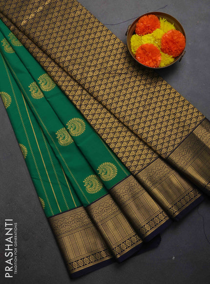 Semi kanchipuram silk saree green and navy blue with allover zari weaves & buttas and zari woven border