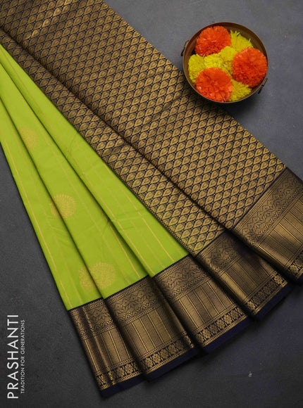 Semi kanchipuram silk saree fluorecent green and navy blue with allover zari weaves & buttas and zari woven border
