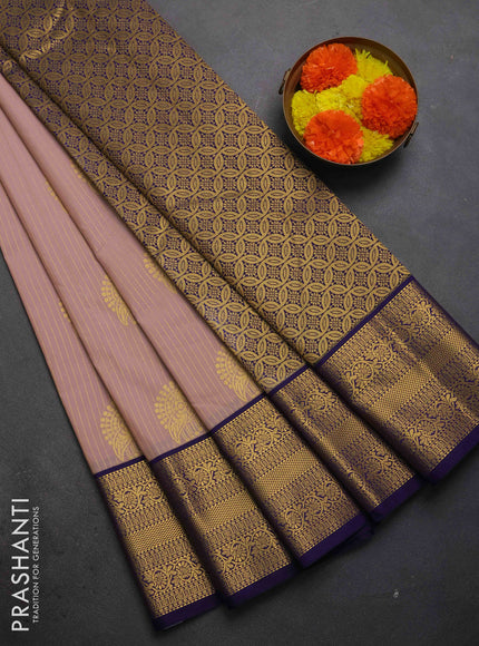 Semi kanchipuram silk saree pastel pink and navy blue with allover zari weaves & buttas and zari woven border
