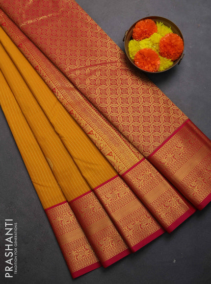 Semi kanchipuram silk saree mustard yellow and pink with allover zari weaves & buttas and zari woven border