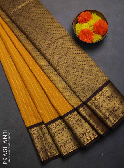 Semi kanchipuram silk saree mustard yellow and coffee brown with allover checks & zari woven buttas and zari woven border