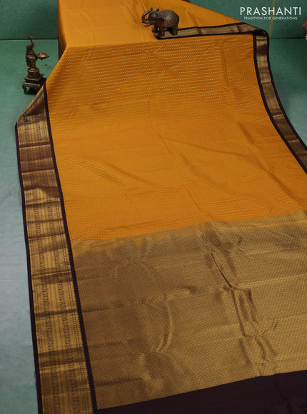 Semi kanchipuram silk saree mustard yellow and coffee brown with allover checks & zari woven buttas and zari woven border