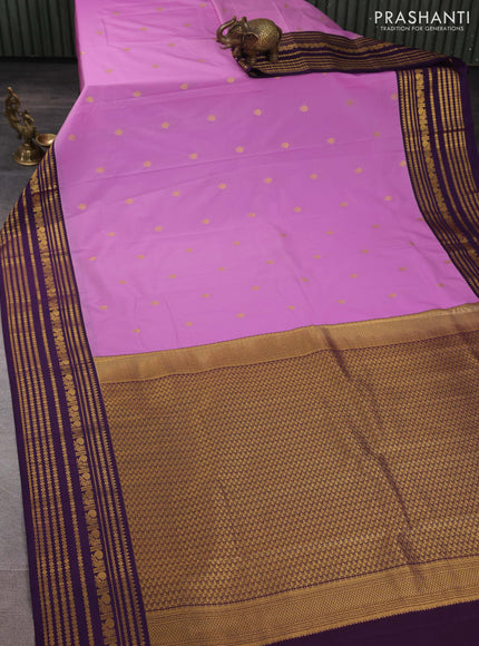 Semi kanchipuram silk saree lavender and violet with zari woven buttas and long zari woven korvai border