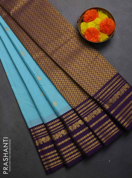 Semi kanchipuram silk saree teal blue and purple with zari woven buttas and long zari woven korvai border