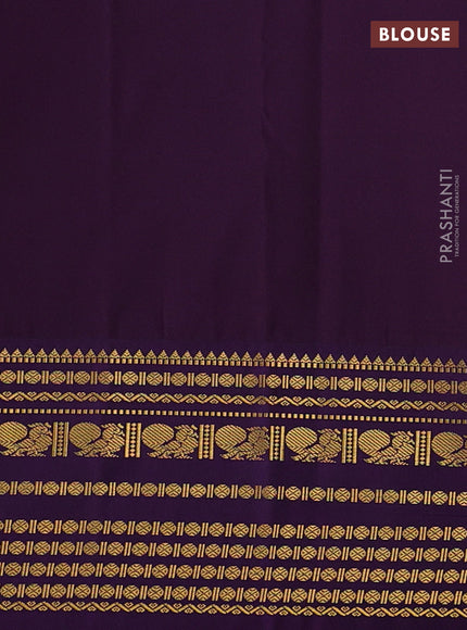 Semi kanchipuram silk saree orange and purple with zari woven buttas and long zari woven korvai border