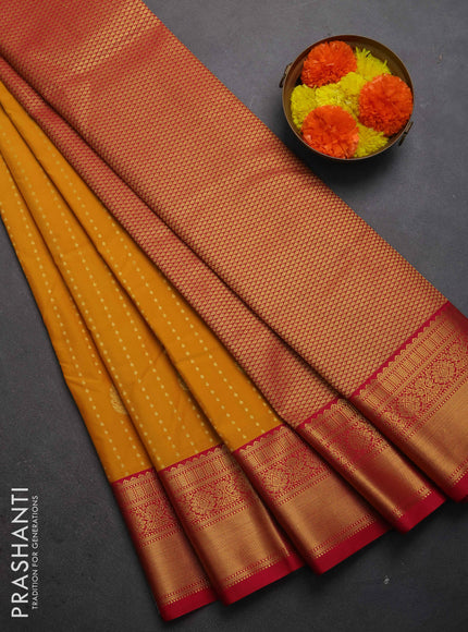 Semi kanchipuram silk saree mustard yellow and pink with allover zari woven 1000 buttas and zari woven border