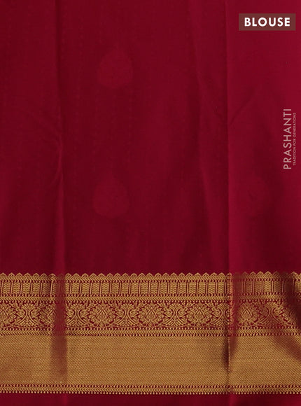 Semi kanchipuram silk saree mustard yellow and pink with allover zari woven 1000 buttas and zari woven border