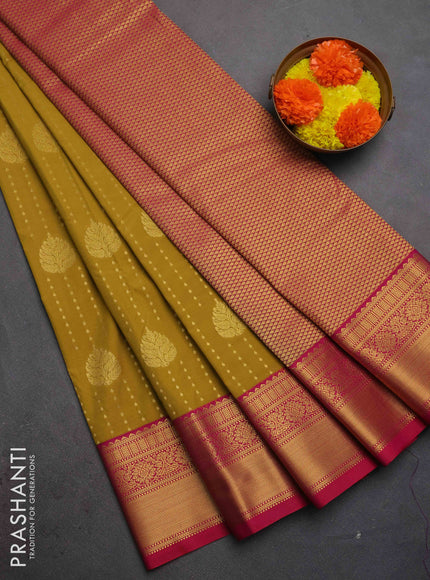 Semi kanchipuram silk saree mustard green and pink with allover zari woven 1000 buttas and zari woven border