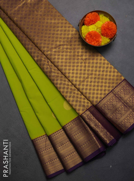 Semi kanchipuram silk saree lime green and purple with zari woven buttas and zari woven border