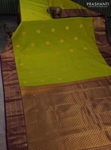 Semi kanchipuram silk saree lime green and purple with zari woven buttas and zari woven border