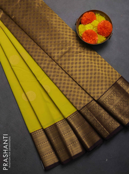 Semi kanchipuram silk saree lime green and coffee brown with zari woven buttas and zari woven border