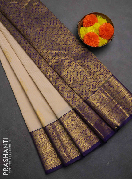Semi kanchipuram silk saree beige and navy blue with allover zari weaves & buttas and zari woven border