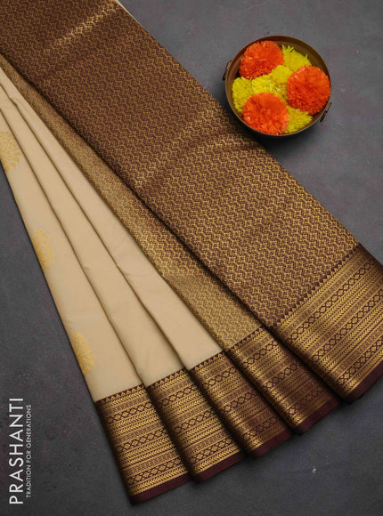 Semi kanchipuram silk saree beige and coffee brown with allover zari woven buttas and zari woven border