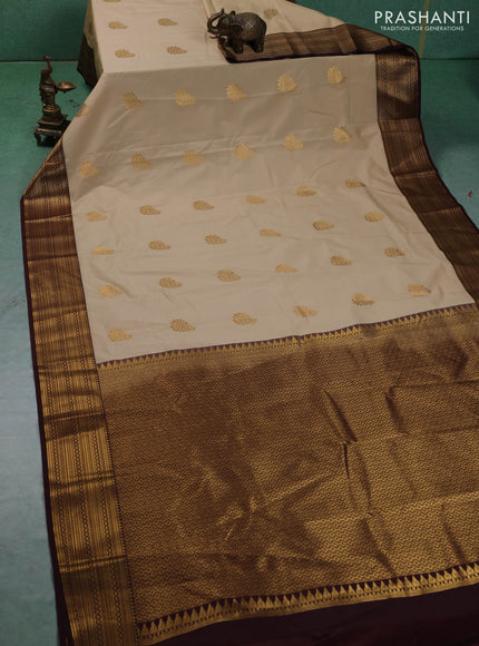 Semi kanchipuram silk saree beige and coffee brown with allover zari woven buttas and zari woven border