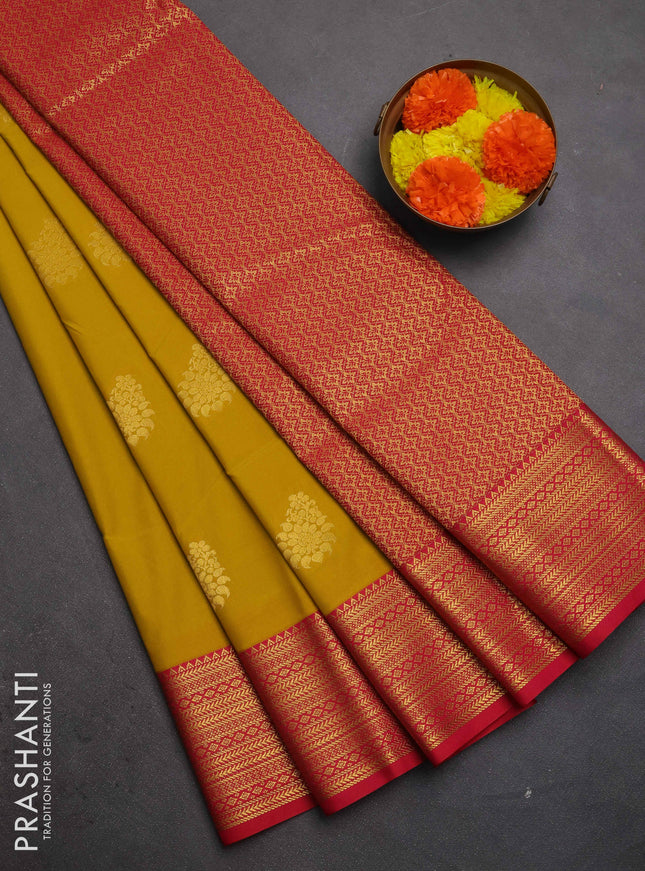 Semi kanchipuram silk saree mustard yellow and pink with zari woven buttas and zari woven border