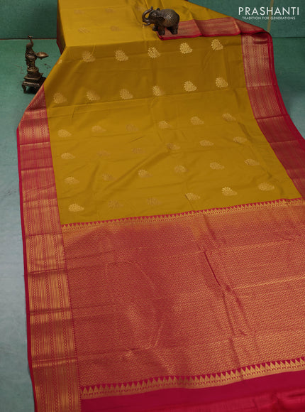Semi kanchipuram silk saree mustard yellow and pink with zari woven buttas and zari woven border
