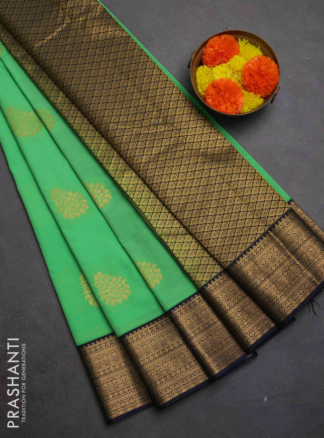 Semi kanchipuram silk saree teal green and navy blue with zari woven buttas and zari woven border