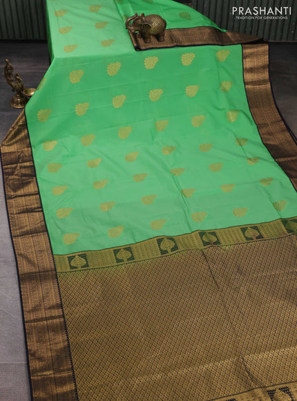 Semi kanchipuram silk saree teal green and navy blue with zari woven buttas and zari woven border